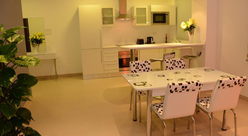 President Heights Aparthotel Manama Quarto foto